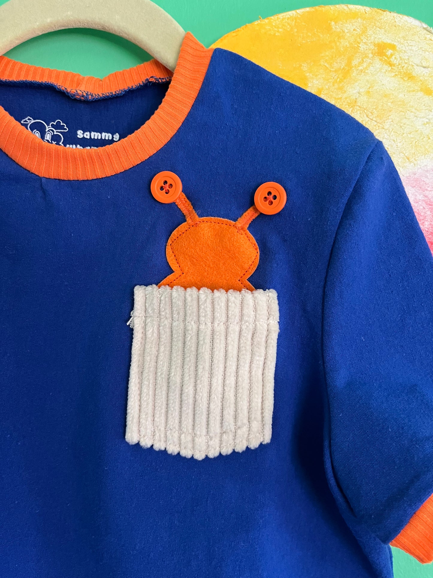 blue and orange t shirt, pocket t shirt, kids pocket t shirt, pocket with alien coming out, pocket with bug coming out, blue and orange kids t shirt, kids t shirt, kids tshirt, kids tee, cobalt blue kids shirt, children's t-shirt, kid's t-shirt, kid's pocket t-shirt