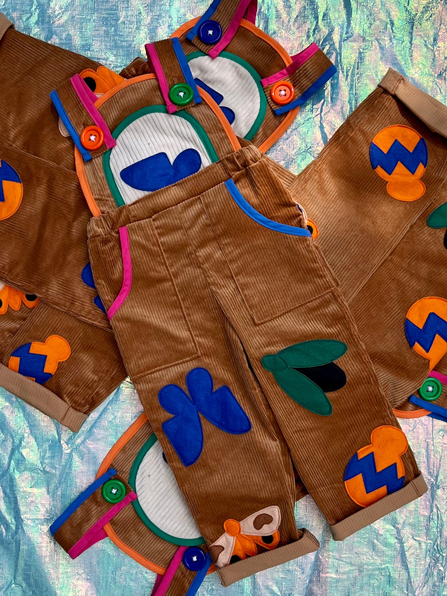 corduroy overalls, fun overalls, kids overalls, gender neutral overalls, kids gender neutral overalls, brown overalls, colorful kids overalls, kids overalls, kids corduroy overalls, bug overalls, patched overalls