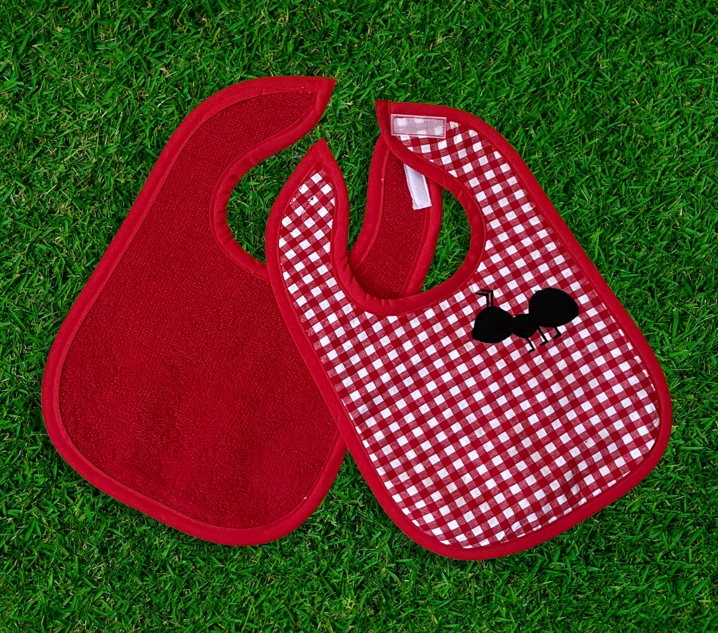 red and white gingham cotton and terrycloth bib with embroidered ant
