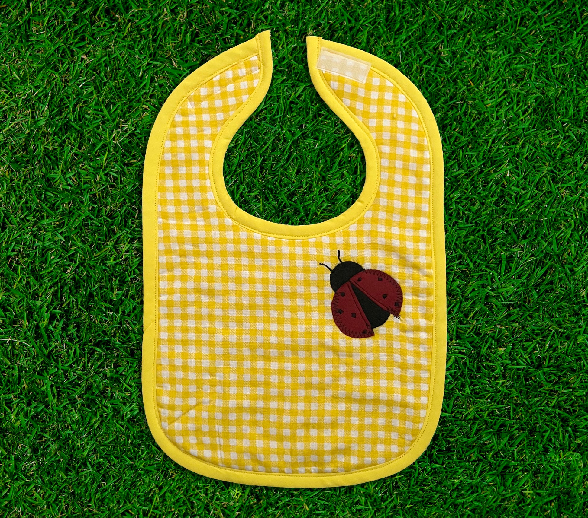 baby bib with ladybug on a yellow gingham fabric, 100% cotton baby bib, 100% cotton terrycloth baby bib, ladybug bib, velcro bib, gingham baby bib, gingham bib