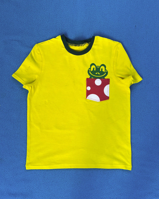 Yellow shirt with a frog on a blue background